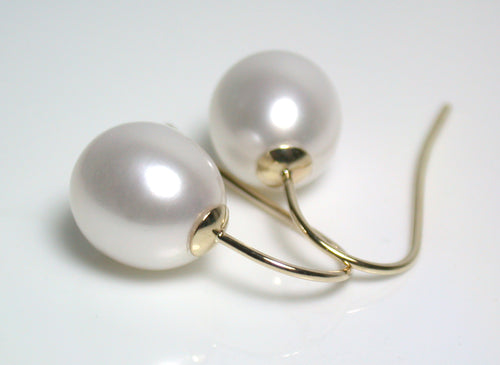 Modern 9.5x11.5mm white freshwater pearl & 9 carat gold earrings